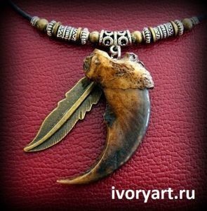 Кігті, ікла - амулети, обереги, символи воїнів